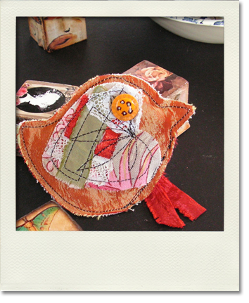 Broche textile "oiseau du paradis"