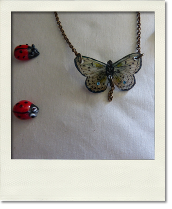 Collier papillon vert clair