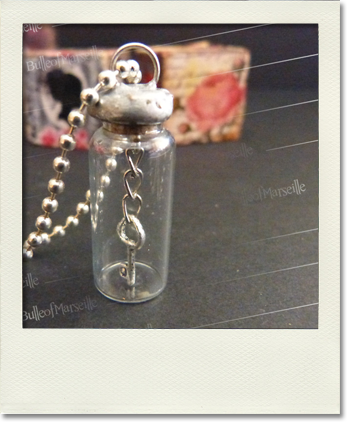 Collier fiole clef